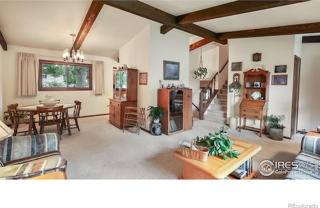 2937 Alamo Ave, Fort Collins, CO 80525 - carpeted living area with a chandelier and stairway