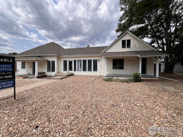 1031 N Lincoln Ave, Loveland, CO 80537 - view of front of home featuring a porch