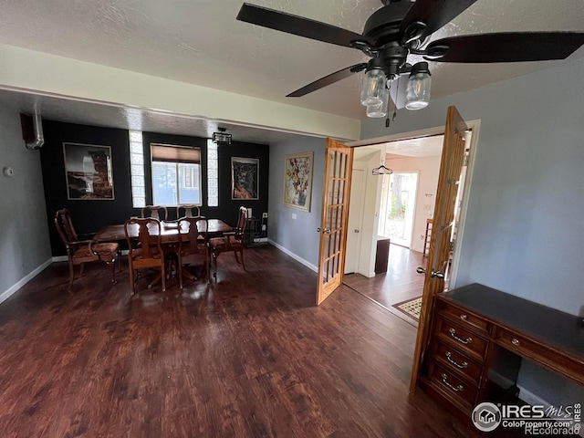 1031 N Lincoln Ave, Loveland, CO 80537 - dining area featuring wood finished floors, plenty of natural light, and a ceiling fan