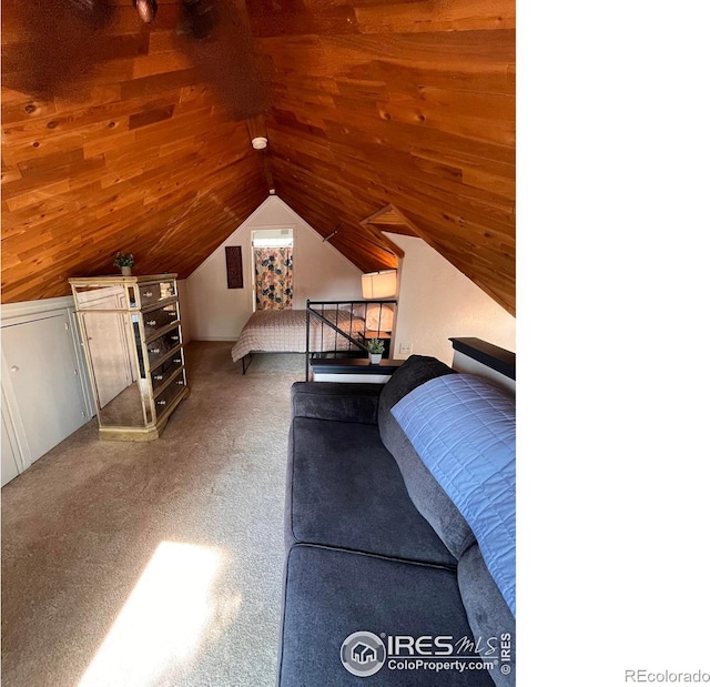 1031 N Lincoln Ave, Loveland, CO 80537 - bedroom featuring carpet and vaulted ceiling
