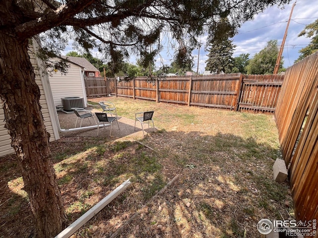 1031 N Lincoln Ave, Loveland, CO 80537 - fenced backyard with a patio