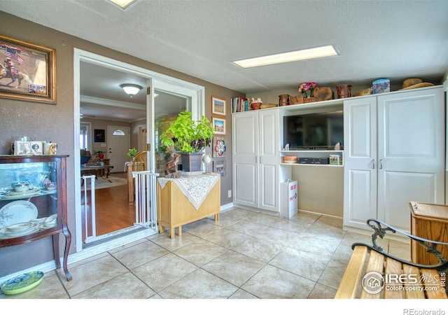1400 Darton Dr, Johnstown, CO 80534 - living room with a textured ceiling and light tile patterned floors