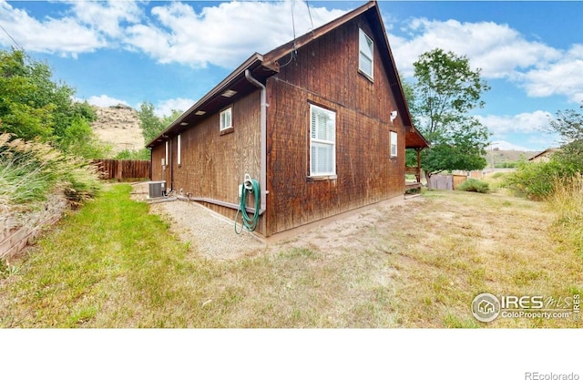 5001 W County Road 38 E, Fort Collins, CO 80526 - view of side of home featuring a central air condition unit