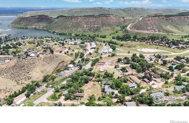 5001 W County Road 38 E, Fort Collins, CO 80526 - aerial view of property and surrounding area featuring a water and mountain view