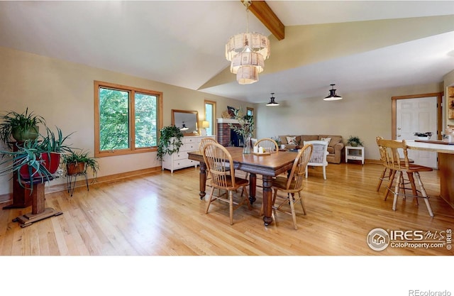 2319 Cotswold Ct, Fort Collins, CO 80526 - dining area with light wood finished floors and a chandelier