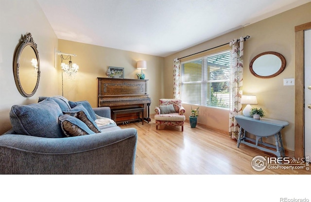 2319 Cotswold Ct, Fort Collins, CO 80526 - living area featuring light wood-style floors and baseboards
