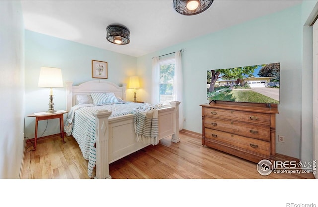 2319 Cotswold Ct, Fort Collins, CO 80526 - bedroom featuring wood finished floors and baseboards