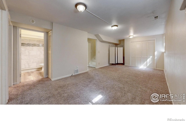 2319 Cotswold Ct, Fort Collins, CO 80526 - unfurnished room featuring carpet floors and stairs