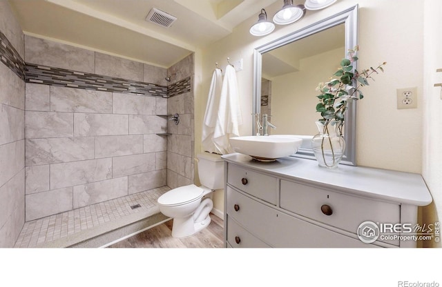 2319 Cotswold Ct, Fort Collins, CO 80526 - bathroom with a stall shower, vanity, and wood finished floors