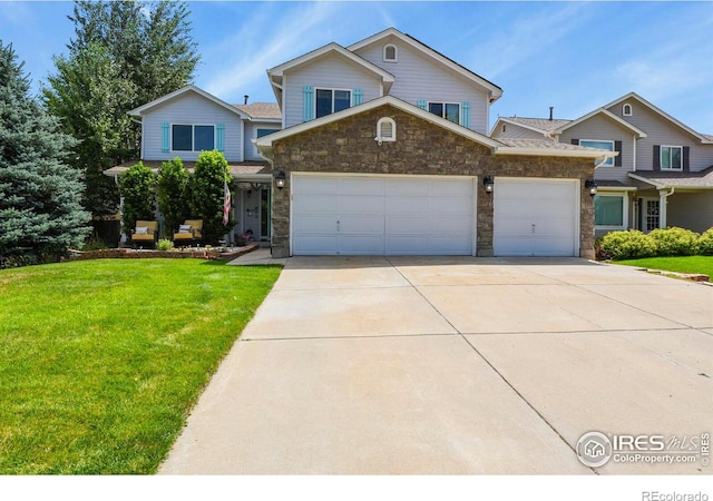 1169 Cooke Ct, Erie, CO 80516 - traditional-style house with driveway, stone siding, an attached garage, and a front lawn