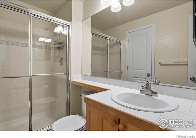 1169 Cooke Ct, Erie, CO 80516 - bathroom with a shower stall and vanity