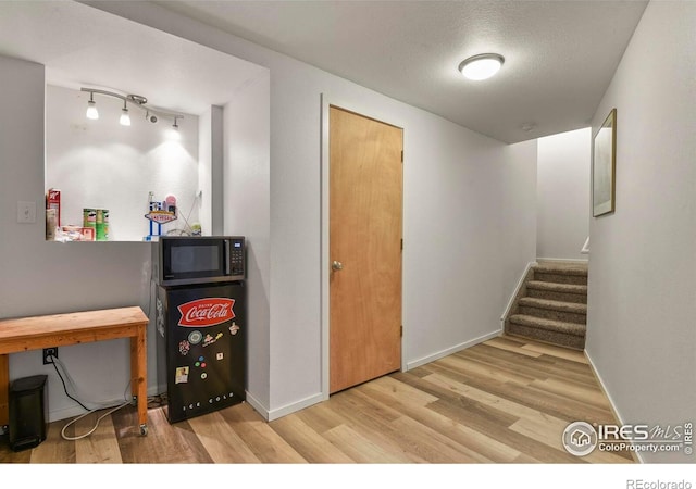 1169 Cooke Ct, Erie, CO 80516 - home office featuring wood finished floors and baseboards