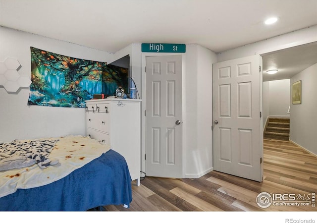 1169 Cooke Ct, Erie, CO 80516 - bedroom with light wood-style flooring and recessed lighting