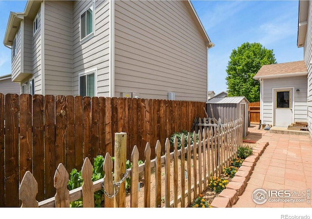 1169 Cooke Ct, Erie, CO 80516 - view of home's exterior featuring a storage shed