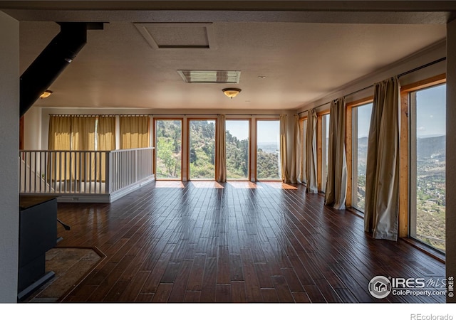 952 Steamboat Valley Rd, Lyons, CO 80540 - unfurnished living room with hardwood / wood-style floors