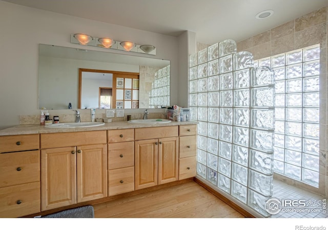 952 Steamboat Valley Rd, Lyons, CO 80540 - bathroom with double vanity and wood finished floors