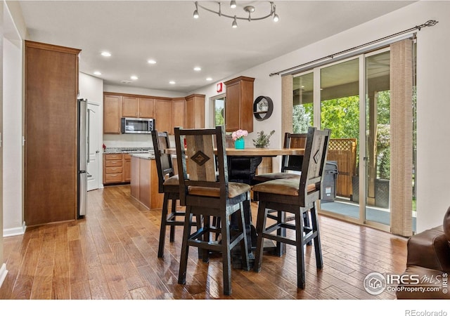 4803 Withers Dr, Fort Collins, CO 80524 - dining area with wood-type flooring and recessed lighting