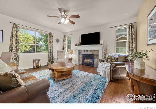 4803 Withers Dr, Fort Collins, CO 80524 - living area featuring a fireplace, wood finished floors, and ceiling fan