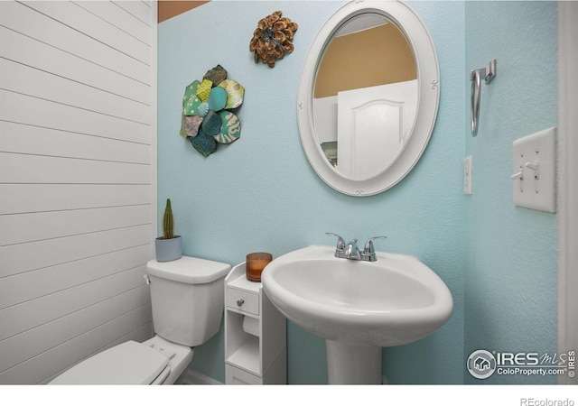 4803 Withers Dr, Fort Collins, CO 80524 - half bathroom with toilet and a sink