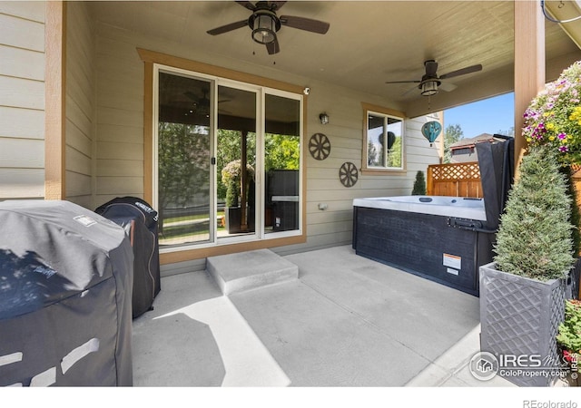 4803 Withers Dr, Fort Collins, CO 80524 - view of patio featuring a ceiling fan, a hot tub, and grilling area