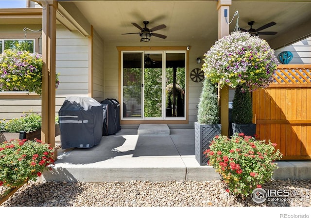 4803 Withers Dr, Fort Collins, CO 80524 - view of exterior entry featuring a ceiling fan and a patio area