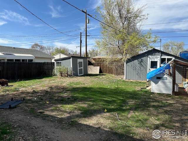 253 7th St, Frederick, CO 80530 - fenced backyard with a shed