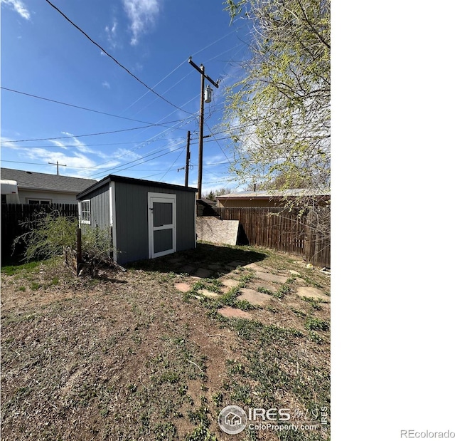 253 7th St, Frederick, CO 80530 - view of yard featuring a storage unit