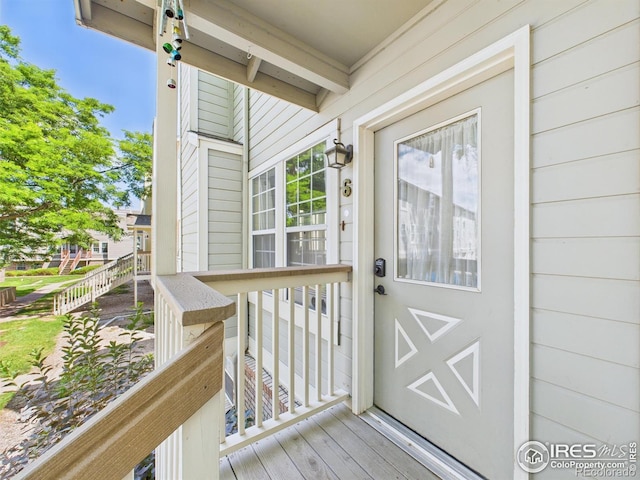 3200 Azalea Dr # 6, Fort Collins, CO 80526 - view of exterior entry with a porch