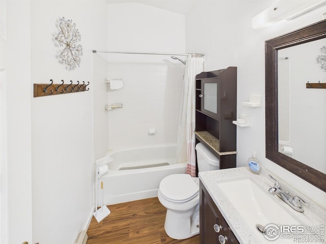 3200 Azalea Dr # 6, Fort Collins, CO 80526 - full bathroom with vanity, shower / bath combo with shower curtain, wood finished floors, and baseboard heating