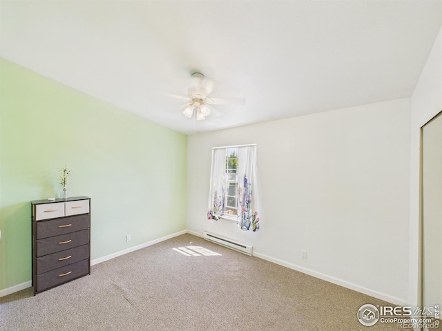 3200 Azalea Dr # 6, Fort Collins, CO 80526 - unfurnished bedroom featuring baseboard heating, carpet floors, and ceiling fan