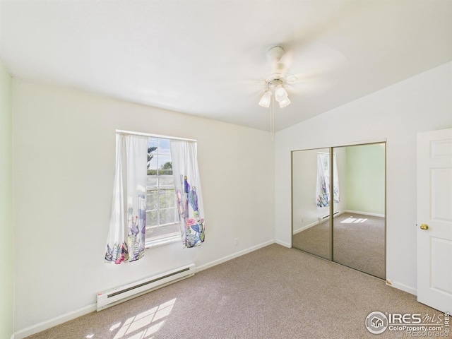 3200 Azalea Dr # 6, Fort Collins, CO 80526 - unfurnished bedroom featuring a baseboard radiator, carpet flooring, a closet, lofted ceiling, and a ceiling fan