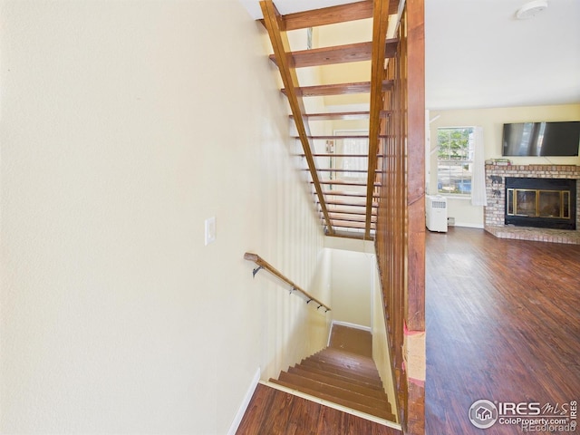 3200 Azalea Dr # 6, Fort Collins, CO 80526 - stairs featuring wood finished floors and a fireplace