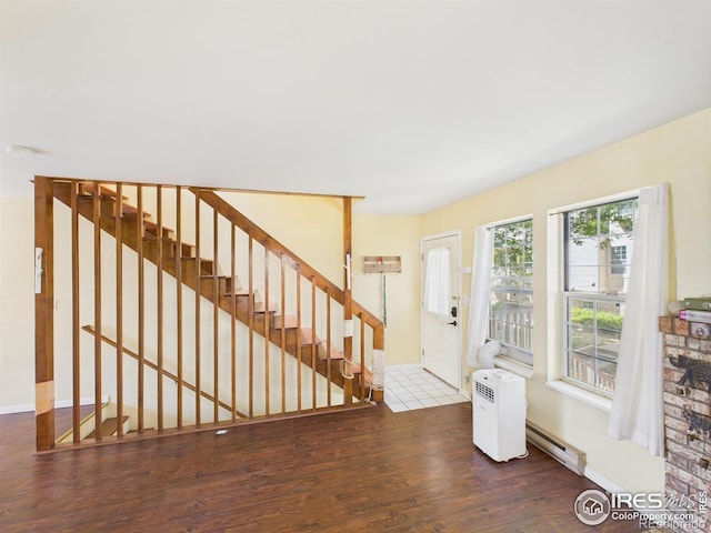 3200 Azalea Dr # 6, Fort Collins, CO 80526 - foyer with wood finished floors, a baseboard radiator, and stairway