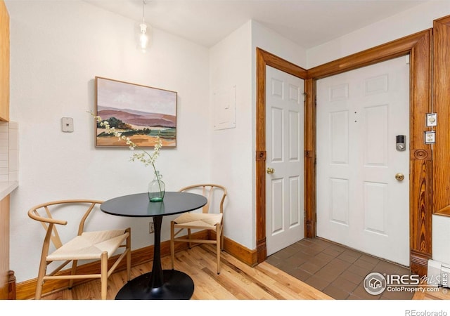 1430 18th St Unit 1, Boulder, CO 80302 - entrance foyer featuring wood finished floors and electric panel