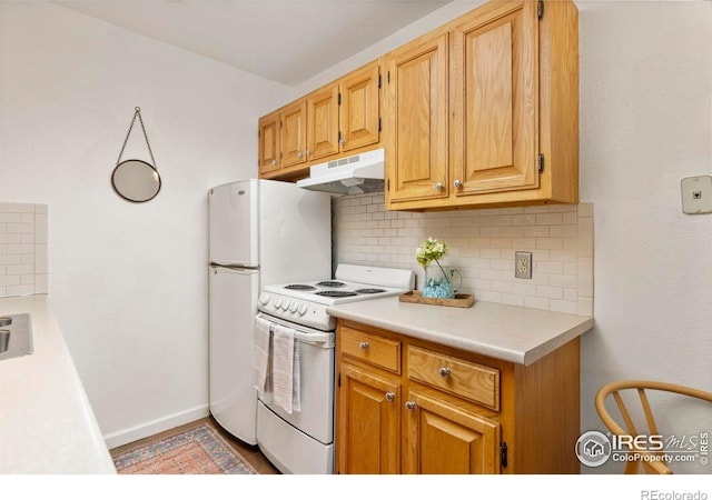 1430 18th St Unit 1, Boulder, CO 80302 - kitchen featuring white electric range oven, decorative backsplash, under cabinet range hood, and light countertops