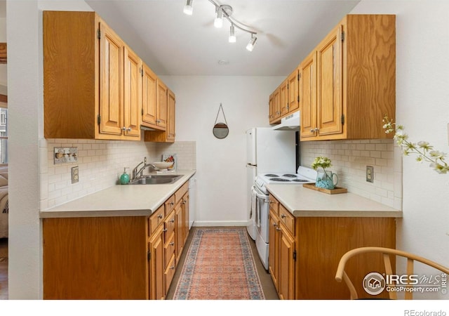 1430 18th St Unit 1, Boulder, CO 80302 - kitchen with white range with electric stovetop, light countertops, and backsplash