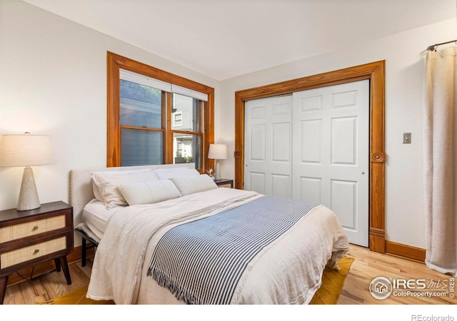 1430 18th St Unit 1, Boulder, CO 80302 - bedroom with a closet and light wood finished floors