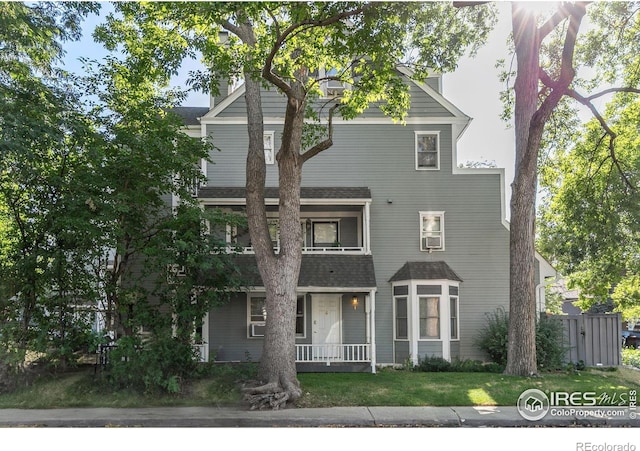 1430 18th St Unit 1, Boulder, CO 80302 - view of front facade with covered porch, a balcony, and a shingled roof