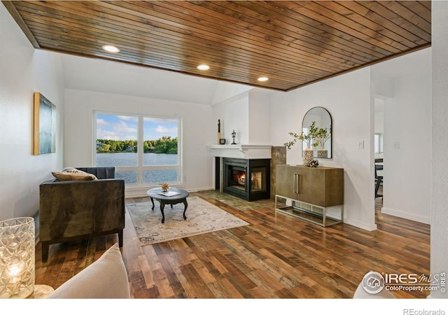 547 Spindrift Ct, Fort Collins, CO 80525 - living room with wooden ceiling, wood finished floors, a multi sided fireplace, a water view, and recessed lighting