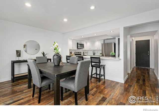 547 Spindrift Ct, Fort Collins, CO 80525 - dining space with dark wood-style floors and recessed lighting