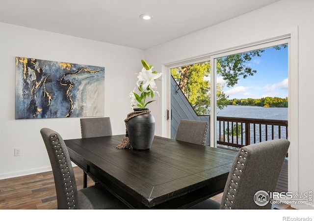 547 Spindrift Ct, Fort Collins, CO 80525 - dining area with wood finished floors, recessed lighting, and a water view