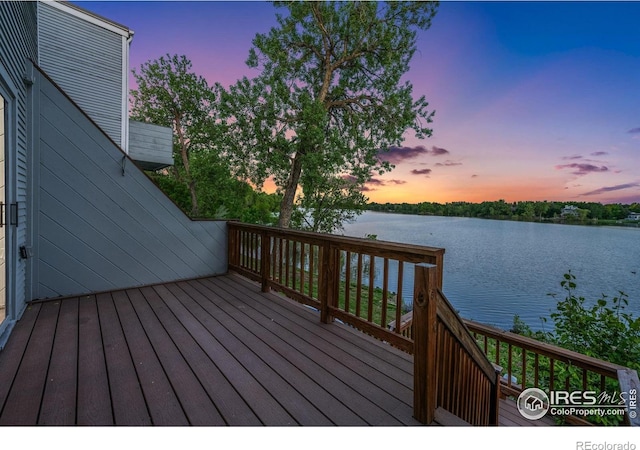 547 Spindrift Ct, Fort Collins, CO 80525 - deck at dusk with a water view