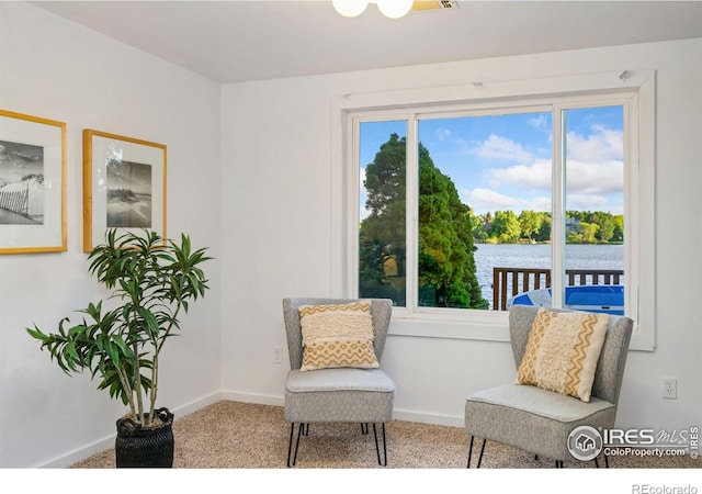 547 Spindrift Ct, Fort Collins, CO 80525 - living area with carpet and a water view