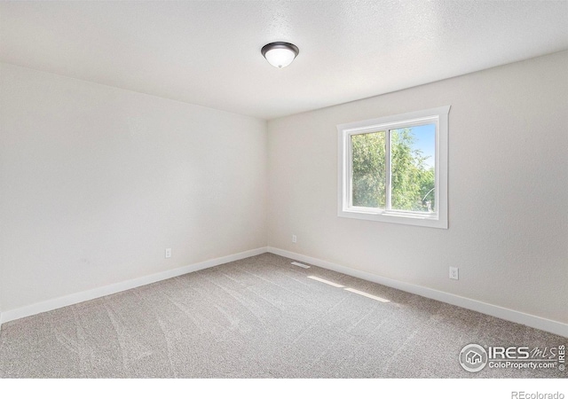 4386 Suncreek Dr, Loveland, CO 80538 - carpeted empty room featuring baseboards