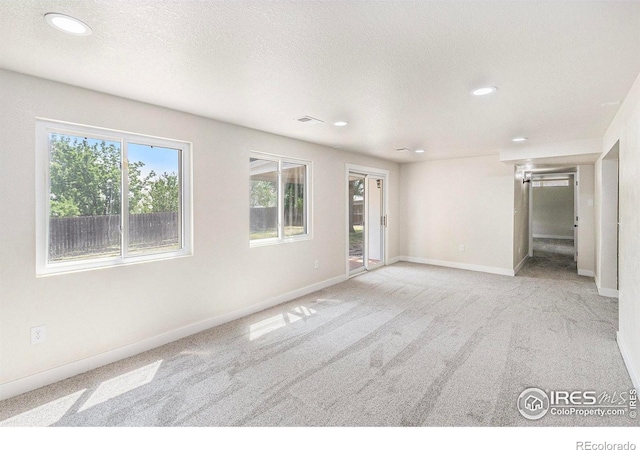 4386 Suncreek Dr, Loveland, CO 80538 - carpeted spare room with recessed lighting and a textured ceiling