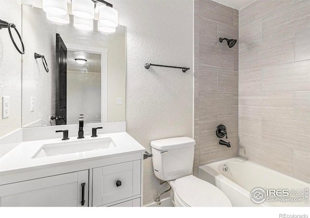 4386 Suncreek Dr, Loveland, CO 80538 - full bath with a textured wall, bathtub / shower combination, and vanity