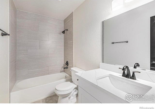 4386 Suncreek Dr, Loveland, CO 80538 - full bath with bathtub / shower combination, vanity, and a textured wall