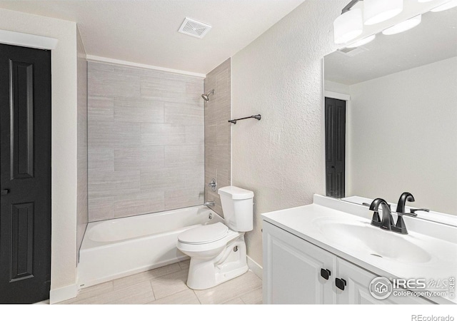 4386 Suncreek Dr, Loveland, CO 80538 - full bathroom with shower / tub combination, vanity, tile patterned floors, and a textured wall