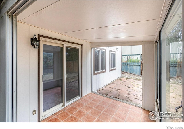 4386 Suncreek Dr, Loveland, CO 80538 - unfurnished sunroom featuring tile patterned flooring