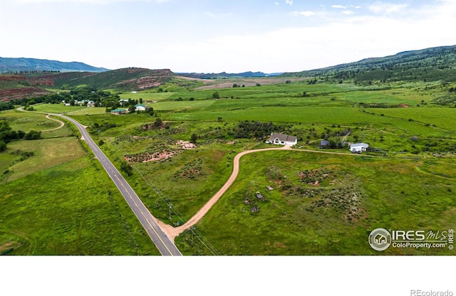 12711 Buckhorn Rd, Loveland, CO 80538 - overview of rural landscape featuring a mountainous background